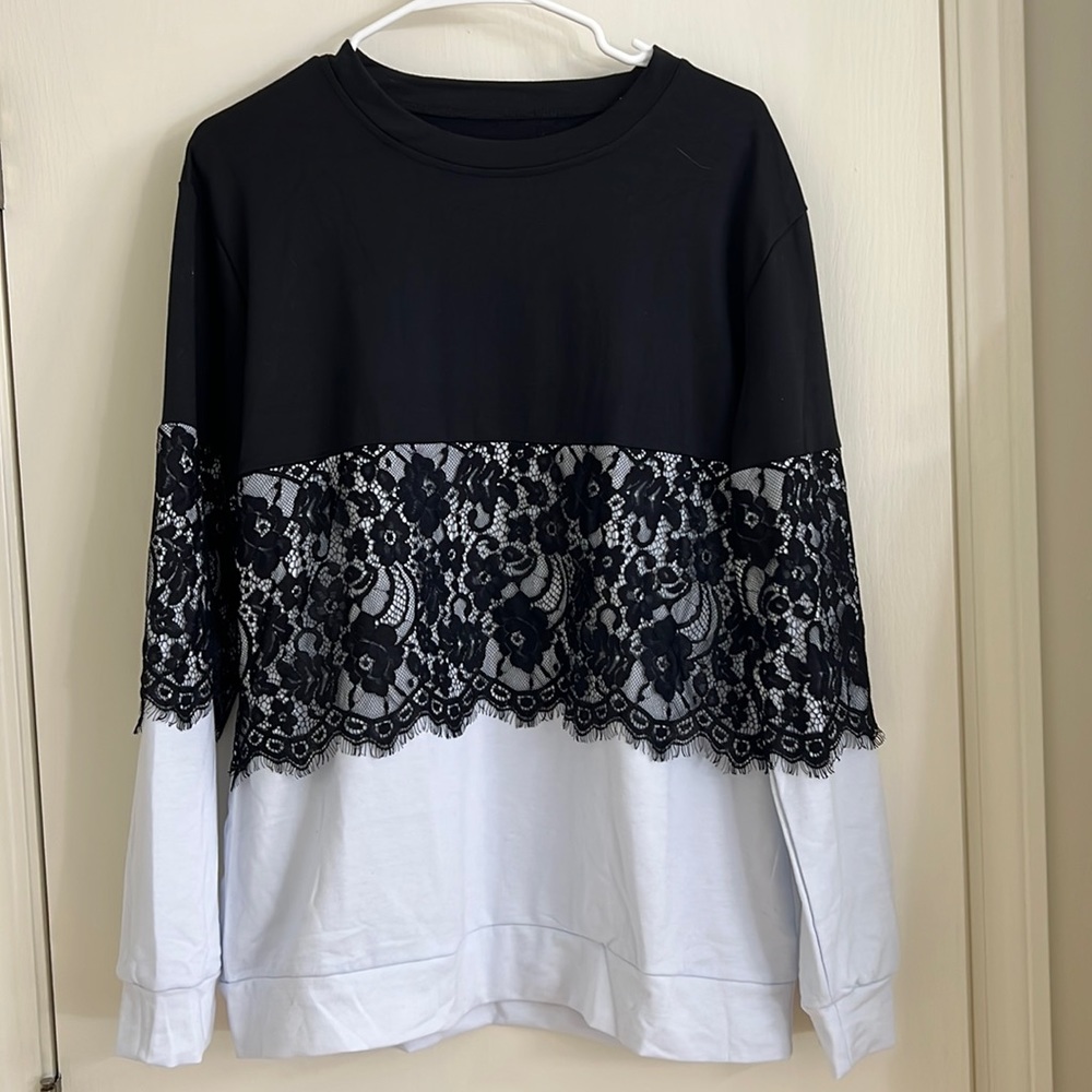 Long sleeve top with lace accents
